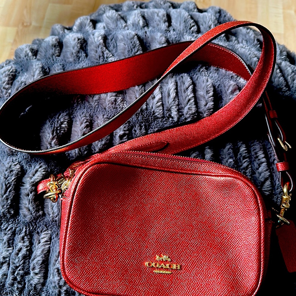 New. (Never worn) Coach Crossbody.